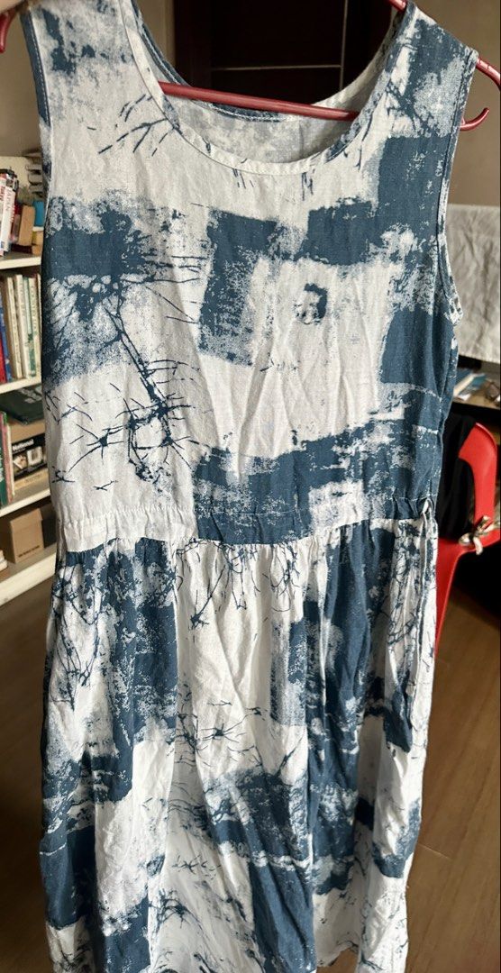 Sleeveless Printed Summer Dress (Category: Dresses) located in Quezon City. Submitted by declutter_incorporated (Listing ID 1438755271, Image 3). Description: - Sleeveless dress with a unique blue and white print. - Features a flattering gathered waist. - Comfortable round neckline. - Made from lightweight fabric, perfect for warm weather. - Relaxed fit. - Mid-calf length. - Ideal for casual outings and the beach..