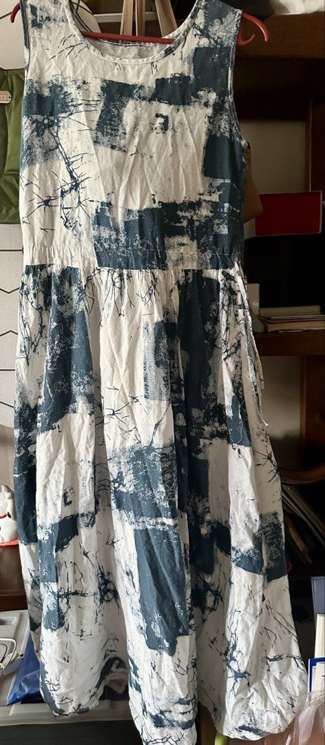 Sleeveless Printed Summer Dress (Category: Dresses) located in Quezon City. Submitted by declutter_incorporated (Listing ID 1438755271, Image 2). Description: - Sleeveless dress with a unique blue and white print. - Features a flattering gathered waist. - Comfortable round neckline. - Made from lightweight fabric, perfect for warm weather. - Relaxed fit. - Mid-calf length. - Ideal for casual outings and the beach..