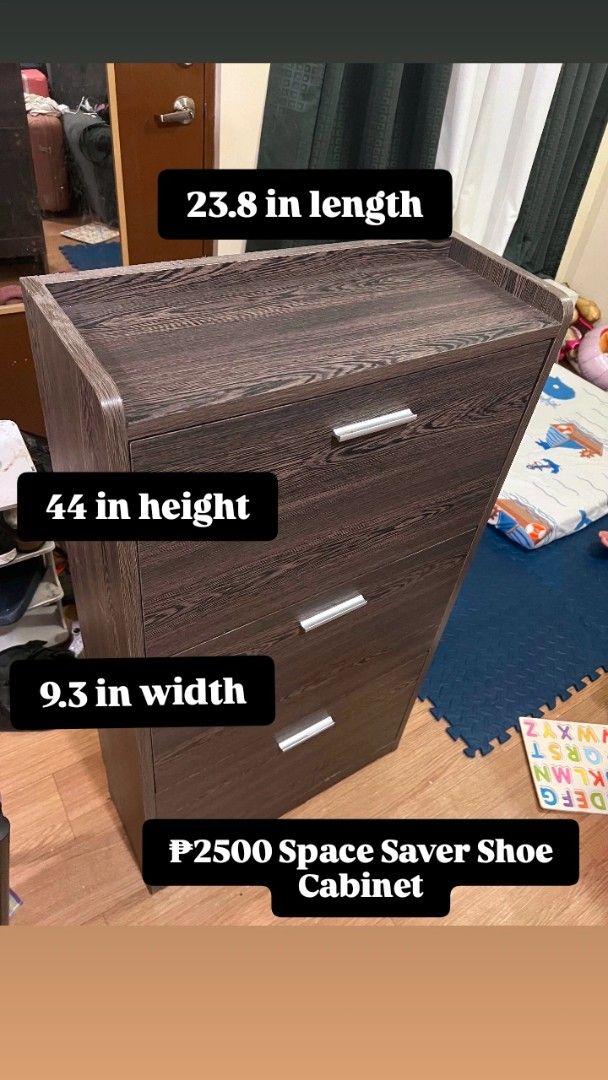 Space Saver Shoe Cabinet (Category: Shelves, Cabinets & Racks) located in Taguig. Submitted by andrenalin (Listing ID 1438845800, Image 1). Description: - Space-saving shoe cabinet - Dark wood grain finish - 3 compartments - Dimensions: 23.8" Length x 44" Height x 9.3" Width - Keeps shoes organized and accessible - Price: P2500.
