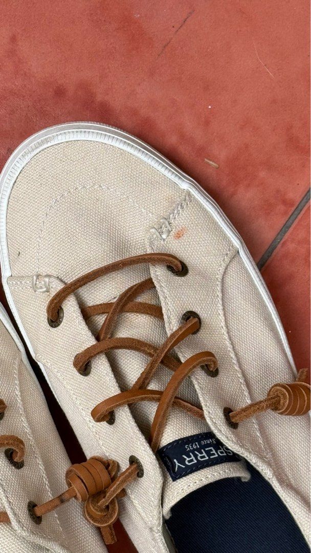 Sperry Shoes (Category: Sneakers) located in Paranaque City. Submitted by declutteringFA (Listing ID 1438719512, Image 2). Description: As good as new condition Only issue is the small orange stain .