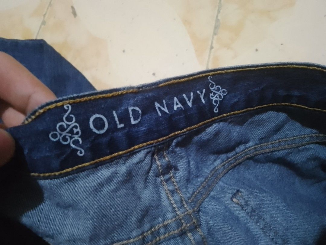 Straight cut Old Navy Distressed Jeans - Size 8 (Category: Jeans) located in Bulacan. Submitted by libiran.1 (Listing ID 1438825146, Image 2). Description: - Old Navy jeans - Classic blue wash - Button closure with Old Navy logo - Distressed design - Size 8, regular fit - 100% cotton.