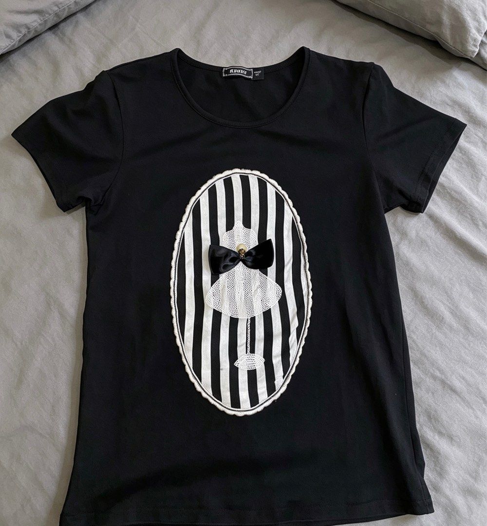 Stylish Black Statement Top | From US (Category: Shirts) located in Rizal. Submitted by everydaychic (Listing ID 1438552243, Image 1). Description: 𝙋𝙡𝙚𝙖𝙨𝙚 𝙗𝙚 𝙖𝙙𝙫𝙞𝙨𝙚𝙙 𝙩𝙝𝙖𝙩 𝙤𝙣𝙡𝙮 𝙗𝙪𝙮𝙚𝙧𝙨 𝙬𝙝𝙤 𝙢𝙖𝙠𝙚 𝙖𝙣 𝙤𝙛𝙛𝙚𝙧 𝙬𝙞𝙡𝙡 𝙗𝙚 𝙖𝙘𝙘𝙤𝙢𝙢𝙤𝙙𝙖𝙩𝙚𝙙. 𝙏𝙝𝙖𝙣𝙠 𝙮𝙤𝙪. Cute and classy black top with unique striped design detail and ribbon accent. Perfect for casual wear or chic everyday outfits. Details: • Color: 