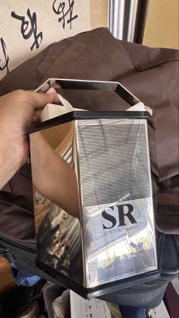 Suntory Royal Ice Bucket Set (Category: Other Kitchenware & Tableware) located in Santa Cruz. Submitted by maqui15 (Listing ID 1438846456, Image 2). Description: - Suntory Royal ice bucket set. - Includes ice bucket, tongs, and serving bowls. - Made of stainless steel. - Features the distinctive SR logo. - Perfect for serving ice and snacks..