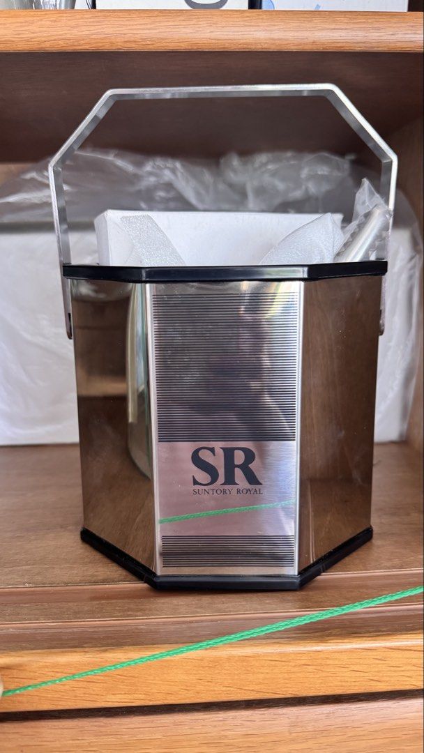 Suntory Royal Ice Bucket Set (Category: Other Kitchenware & Tableware) located in Santa Cruz. Submitted by maqui15 (Listing ID 1438846456, Image 1). Description: - Suntory Royal ice bucket set. - Includes ice bucket, tongs, and serving bowls. - Made of stainless steel. - Features the distinctive SR logo. - Perfect for serving ice and snacks..