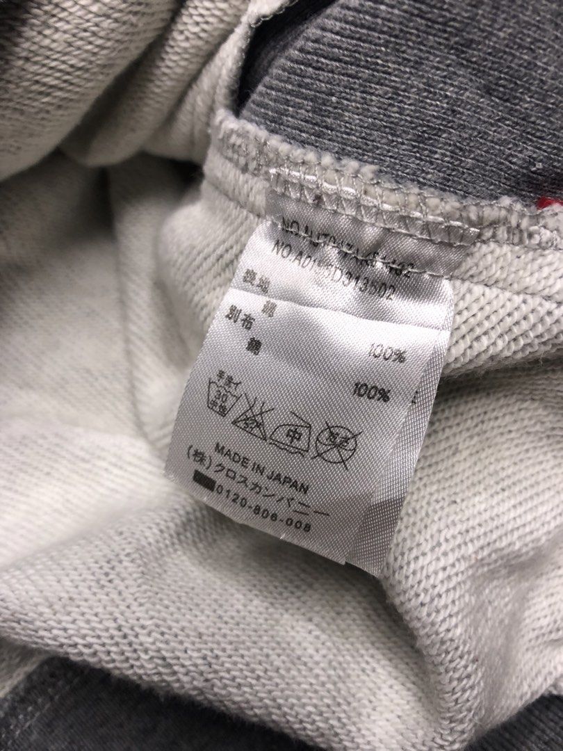 Thom Browne Colorblock Hoodie (Category: Coats, Jackets and Outerwear) located in Quezon City. Submitted by yeahsource222 (Listing ID 1438750289, Image 3). Description: - Thom Browne hoodie - Colorblock design: Grey body, black sleeve with white stripes - Features a hood with drawstrings - Kangaroo pocket - Buttoned cuffs - Made in Japan - Material: 100% cotton.