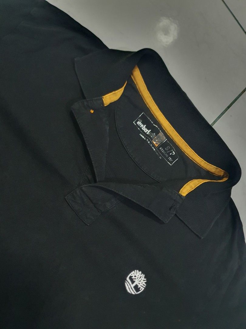 Timberland Black Polo Shirt (Category: Tshirts & Polo Shirts ) located in Cagayan de Oro. Submitted by nosferatau_ (Listing ID 1438866026, Image 2). Description: Timberland Black Polo Shirt length: 26 width: 18 issue: refer to pic need wash loc: cagayan de oro city, mindanao +SF.