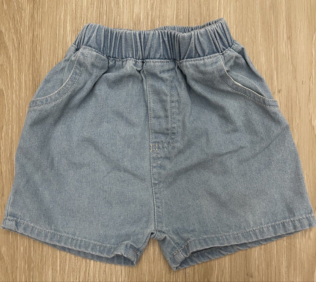Toddler Denim Shorts size 100 (Category: Babies & Kids Fashion) located in Makati City. Submitted by riz.gspr (Listing ID 1438760444, Image 1). Description: - Light blue denim shorts - Elastic waistband - Two front pockets - Simple design - Lightweight denim - Perfect for casual wear.