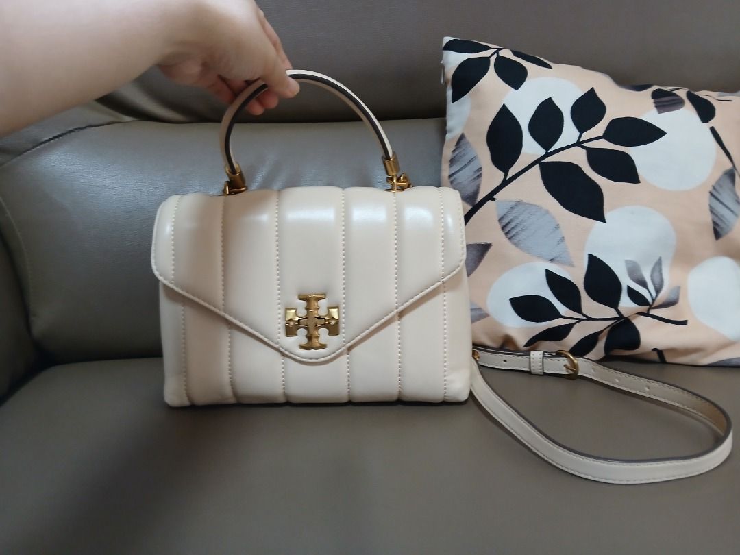Tory Burch Kira Small Top-Handle Satchel Bag Authentic (Category: Luxury Bags & Wallets) located in Manila. Submitted by ideafactoryph (Listing ID 1438788565, Image 3). Description: Tory Burch Kira Small Convertible Shoulder Bag - Authentic, Signature double "T" accent on front with gold-tone hardware. - US bought from official Tory Burch website - Used once only - Cream-colored quilted design - Gold-tone logo - Chain strap and top handle - Inclu