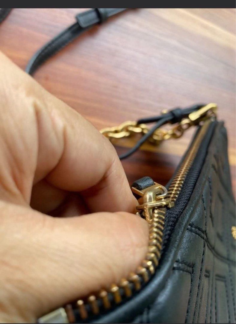 Tory burch sling/kili bag (Category: Luxury Bags & Wallets) located in Oroquieta. Submitted by quickforest_8a519b (Listing ID 1438821205, Image 3). Description: ykk zip with etikta genuine leather can be worn as sling bag or kili bag(removable strap) fits cp spacious .
