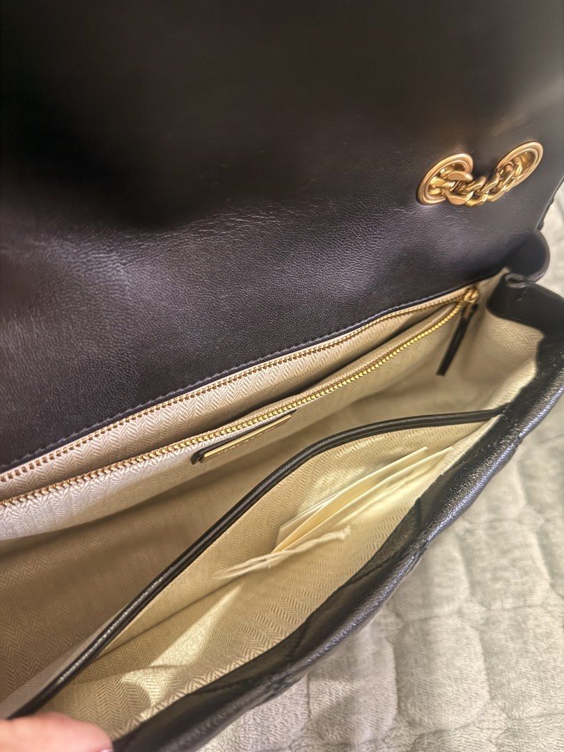 Tory Burch Willa Shoulder Bag in Black (Category: Luxury Bags & Wallets) located in Quezon City. Submitted by loveikit (Listing ID 1438796255, Image 3). Description: Color: Black with gold hardware Comes with original tags Brand new complete with dust bag and paper bag Bought in Japan (Tory Burch Outlet Store).