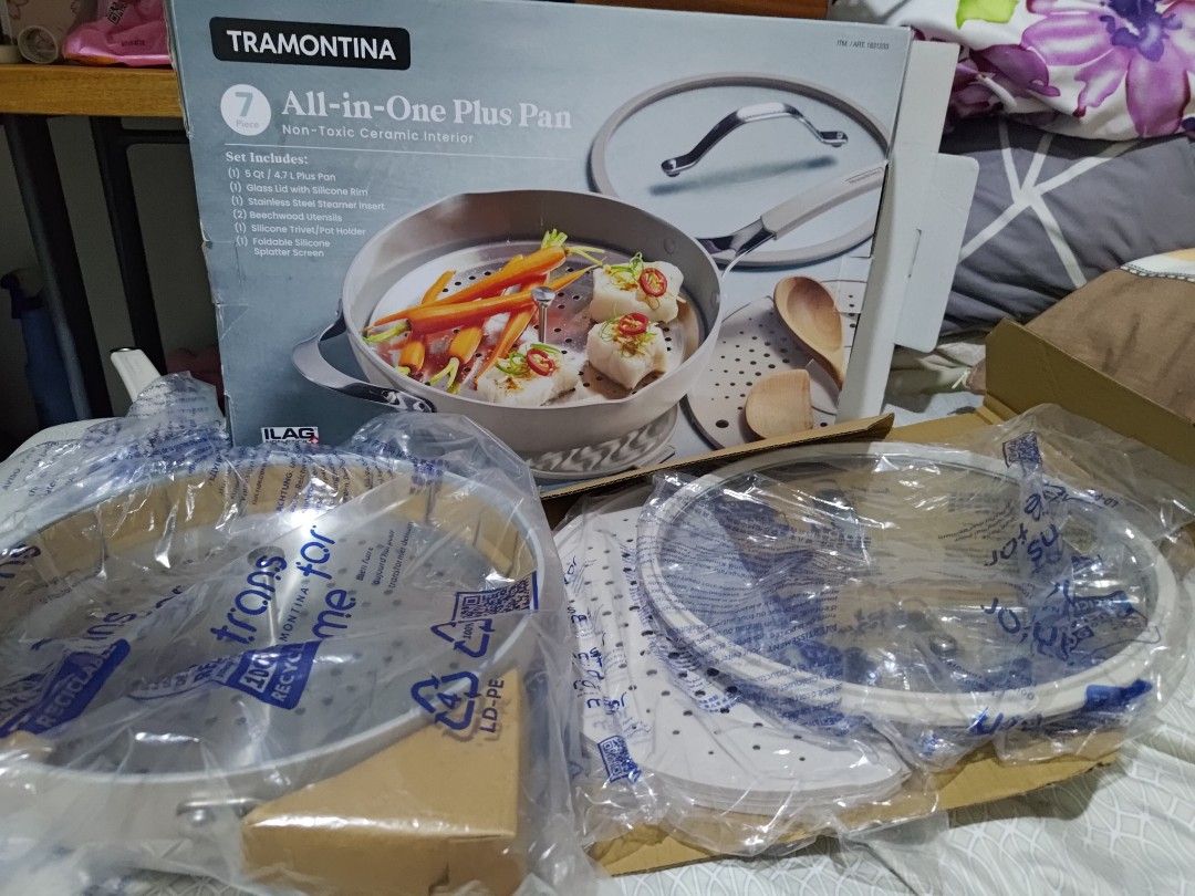 Tramontina All-in-One Plus Pan (Category: Cookware & Accessories) located in Manila. Submitted by ayasellss85933 (Listing ID 1438832506, Image 3). Description: - Tramontina All-in-One Plus Pan set. - Includes (1) 5Qt 4.7L Ceramic pan, (1) Stainless steel steamer insert, (1) Foldable silicone splatter screen, and (1) Glass lid with silicone rim. - Versatile for various cooking methods. - Ideal for steaming, boiling, and more. - Complete set with a