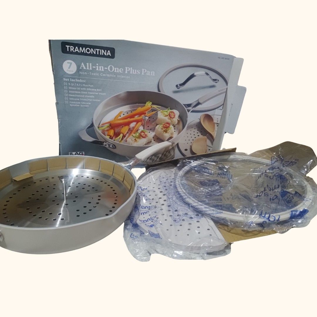 Tramontina All-in-One Plus Pan (Category: Cookware & Accessories) located in Manila. Submitted by ayasellss85933 (Listing ID 1438832506, Image 1). Description: - Tramontina All-in-One Plus Pan set. - Includes (1) 5Qt 4.7L Ceramic pan, (1) Stainless steel steamer insert, (1) Foldable silicone splatter screen, and (1) Glass lid with silicone rim. - Versatile for various cooking methods. - Ideal for steaming, boiling, and more. - Complete set with a