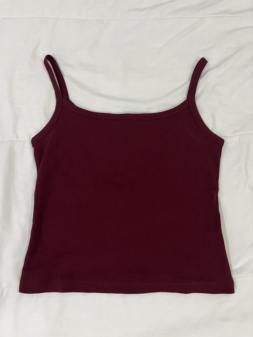 Uniqlo Maroon Tank Top (Category: Sleeveless) located in Makati City. Submitted by mariamarts (Listing ID 1438862066, Image 1). Description: .