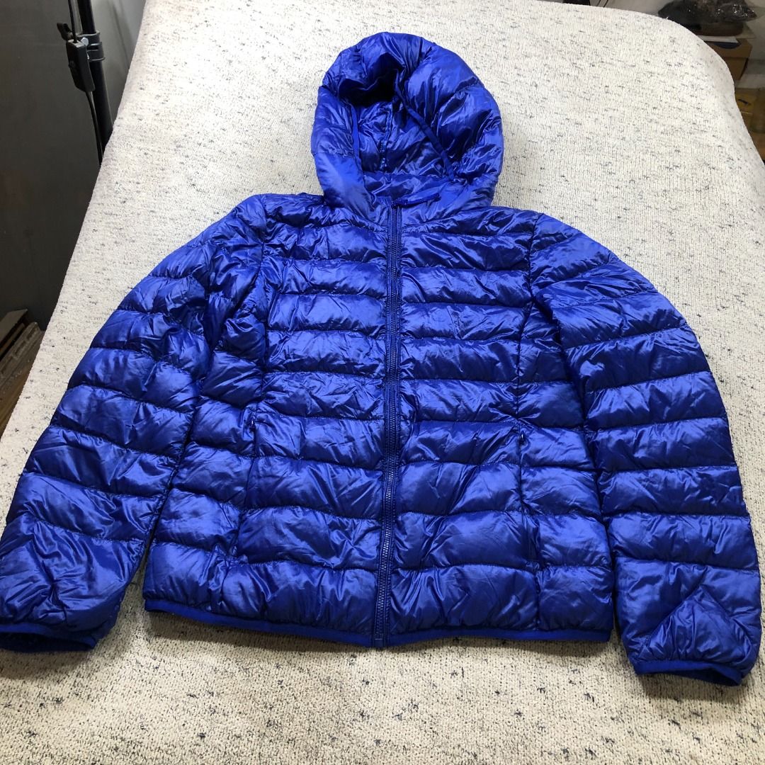 UNIQLO Ultra Light Down Hooded Jacket Blue Small (Category: Coats, Jackets and Outerwear) located in Santa Rosa. Submitted by sergids (Listing ID 1438800457, Image 1). Description: UNIQLO Ultra Light Down Hooded Jacket Blue Small Great condition. Check fitting tops to ensure this fits you. Dimensions below are exact measurements, see pics as well for comparison. 9/10 Condition and Colorway Dimensions: Check pic slide for actual size and dimension