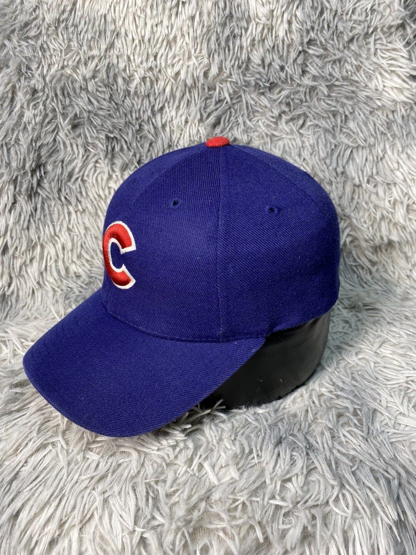 Vintage 90's MLB Chicago Cubs Snapback (Category: Caps & Hats) located in Solano. Submitted by solothrifting (Listing ID 1438879435, Image 3). Description: Vintage 90's MLB Chicago Cubs Snapback Condition: 9/10 minor snap, top button issue Size on tag: One Size Fits All . M/Mine: 1,150 + Shipping Fee.