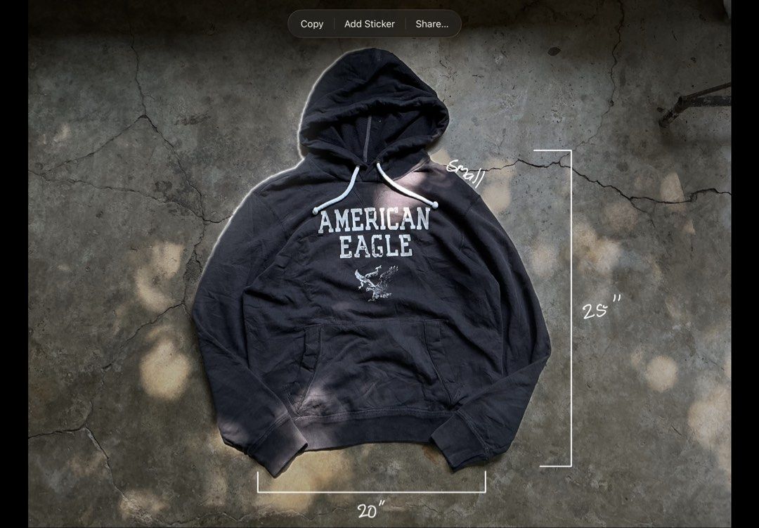 Vintage American Eagle Hoodie (Category: Coats, Jackets and Outerwear) located in San Pablo. Submitted by rushnthrift (Listing ID 1438736395, Image 2). Description: - American Eagle Hoodie: Features the iconic logo and drawstring hood. Measurements: 20 inches across, 25 inches in length. .
