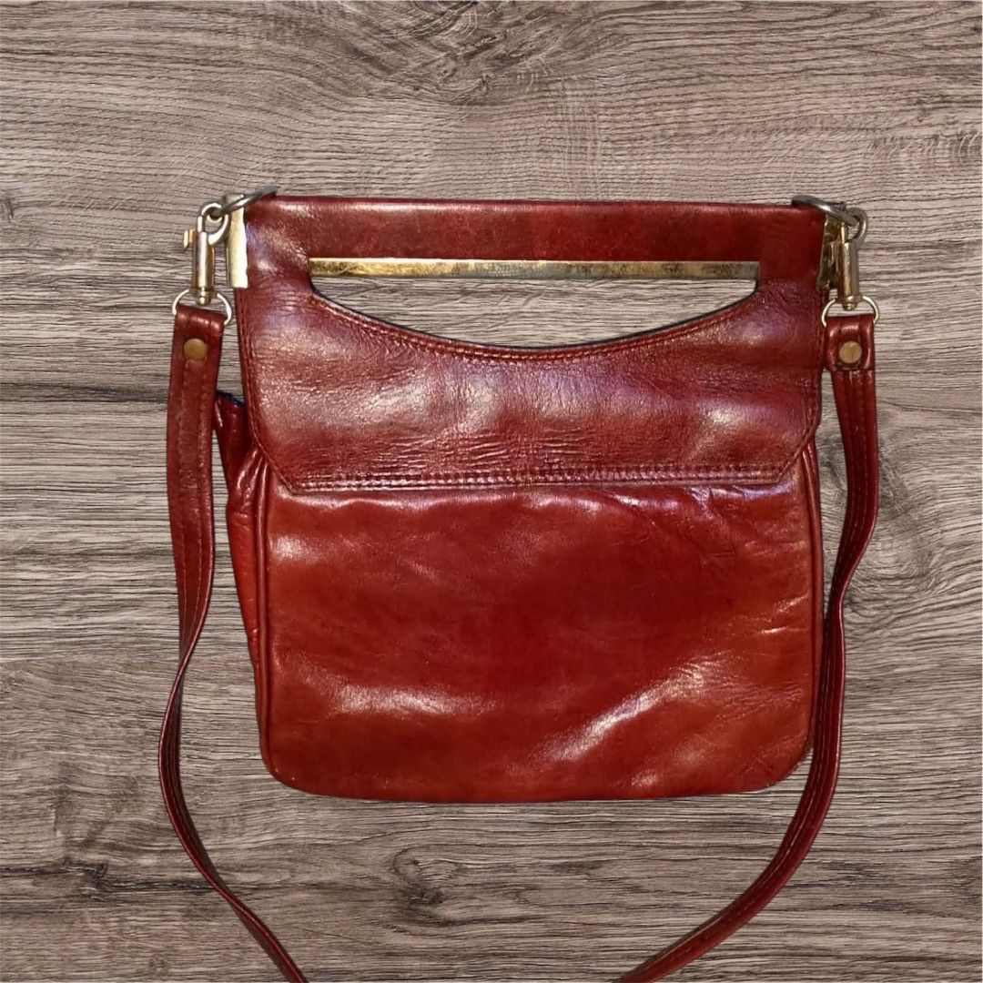 Vintage Brick Red Genuine Leather Bag (Category: Shoulder Bags) located in Cebu City. Submitted by jc_online_shop (Listing ID 1438818096, Image 2). Description: 8" x 10" x 3" brick red color genuine leather material.