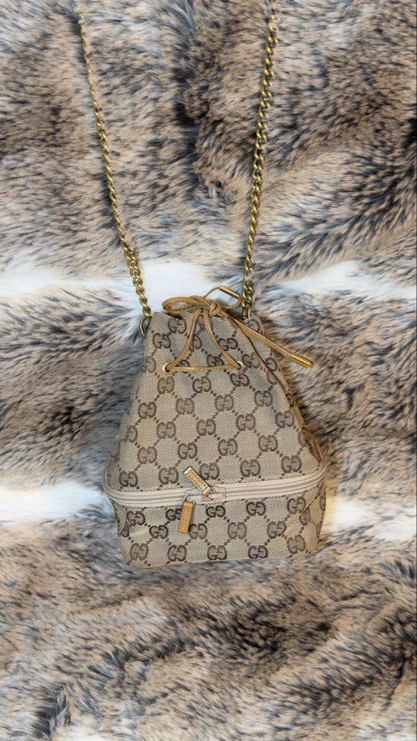 Vintage Gucci DrawString Mini Bucket Bag (Category: Luxury Bags & Wallets) located in Manila. Submitted by wisetree.71201a (Listing ID 1438869515, Image 3). Description: 🎀This bag is very cute, iconic and timeless piece. Can wear everyday. —come with Original Dust Bag —canvas material —measurements w14.5 x h18 x d8.5 (cm) ❤️this items are cleaned inside and out. .