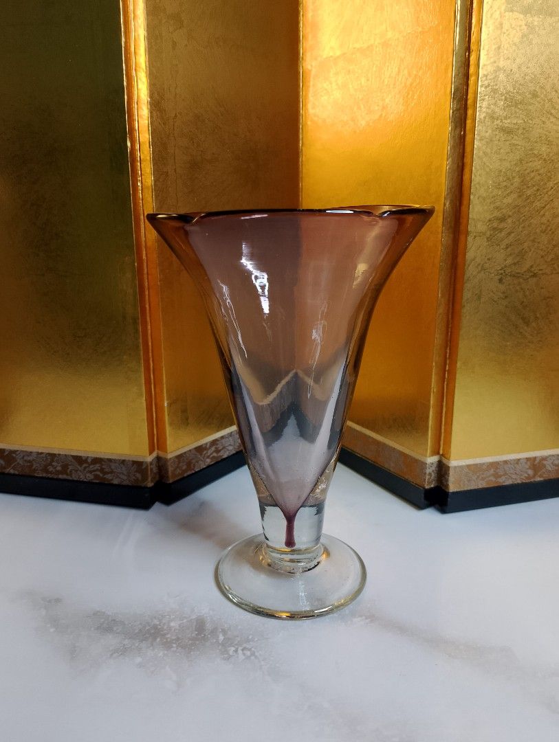 Vintage Handblown Glass Vase (Category: Vases & Decorative Bowls) located in Valenzuela. Submitted by buylaaaaa (Listing ID 1438784911, Image 1). Description: - Vintage glass vase - Unique shape and color gradient - Brown and purple hues - Flared top with scalloped rim - Clear base - Approximately 8 inches tall - 5 inches diameter at the top.