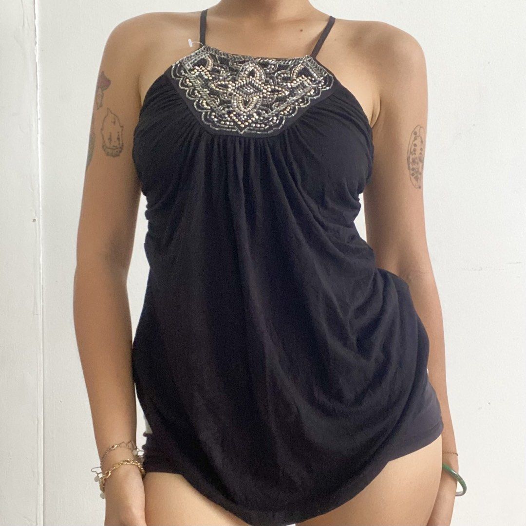 White House Black Market Embellish Sequin top (Category: Sleeveless) located in San Fernando. Submitted by zpoilednamilk (Listing ID 1438717745, Image 1). Description: - White House Black Market black top - Halter neck design - Can fit size S-M - Intact Sequins.