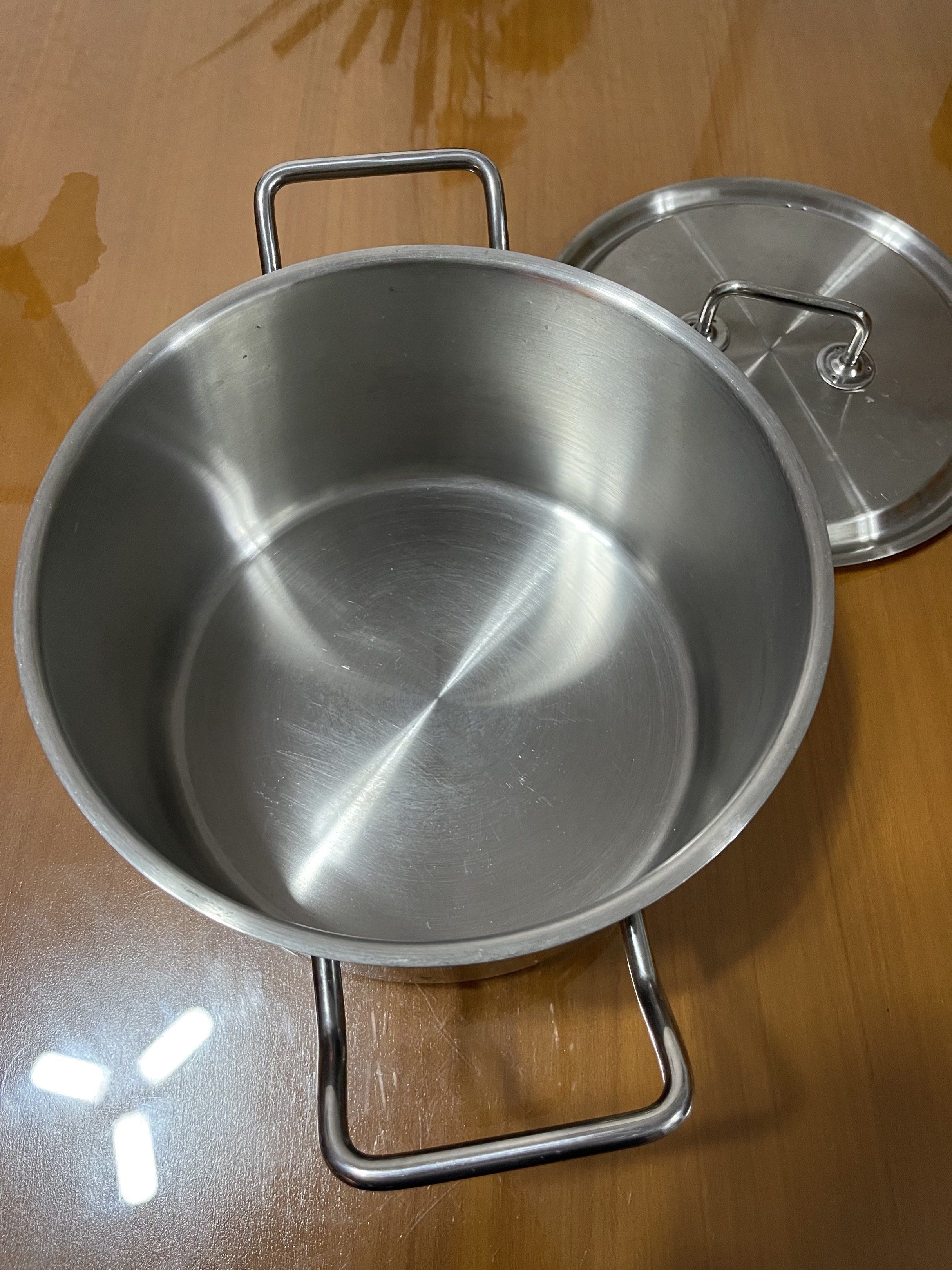 Woll Germany Stainless Steel Pot (Category: Cookware & Accessories) located in Quezon City. Submitted by doublelkitchenware (Listing ID 1438767232, Image 2). Description: Woll Germany Stainless Steel Pot Made in Germany 24x14cm Induction / Gas / Electric Solid makapal and mabigat pati cover Minimal sign of usage Pick up or shipping via lalamove Provincial 🚚j&t Novaliches Qc.