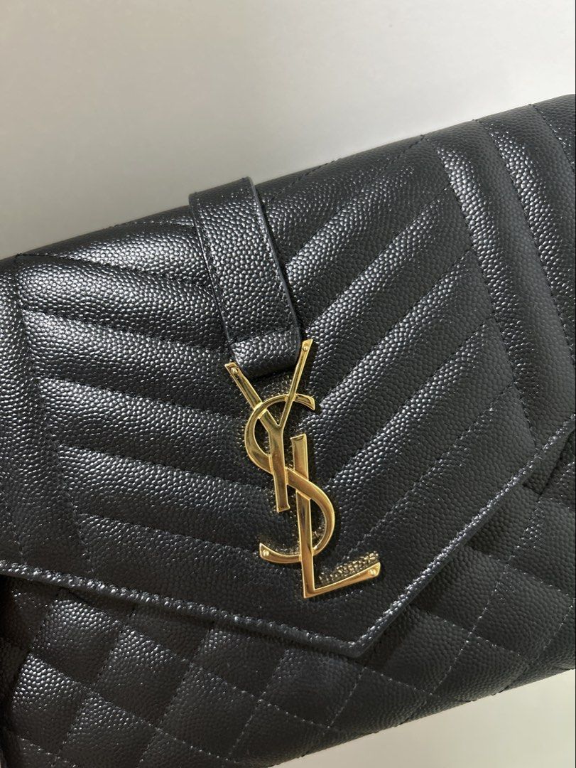YSL Clutch (Category: Luxury Bags & Wallets) located in Pasig City. Submitted by fifinds2020 (Listing ID 1438712351, Image 1). Description: YSL Envelope clutch Comes with dust bag, box and paper bag.