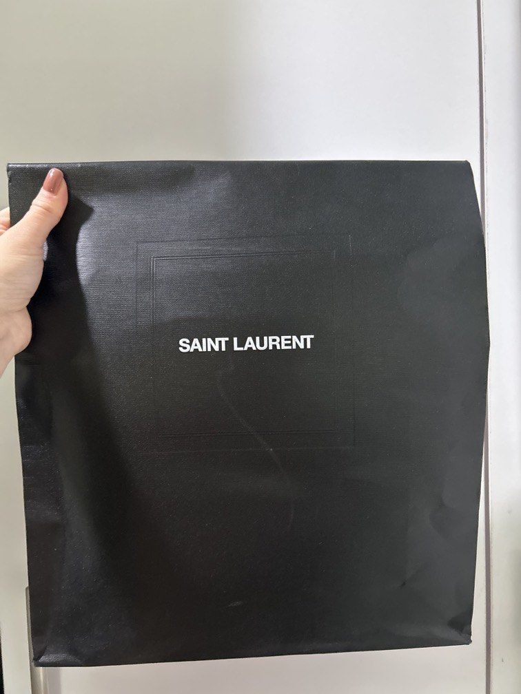 YSL Clutch (Category: Luxury Bags & Wallets) located in Pasig City. Submitted by fifinds2020 (Listing ID 1438712351, Image 2). Description: YSL Envelope clutch Comes with dust bag, box and paper bag.