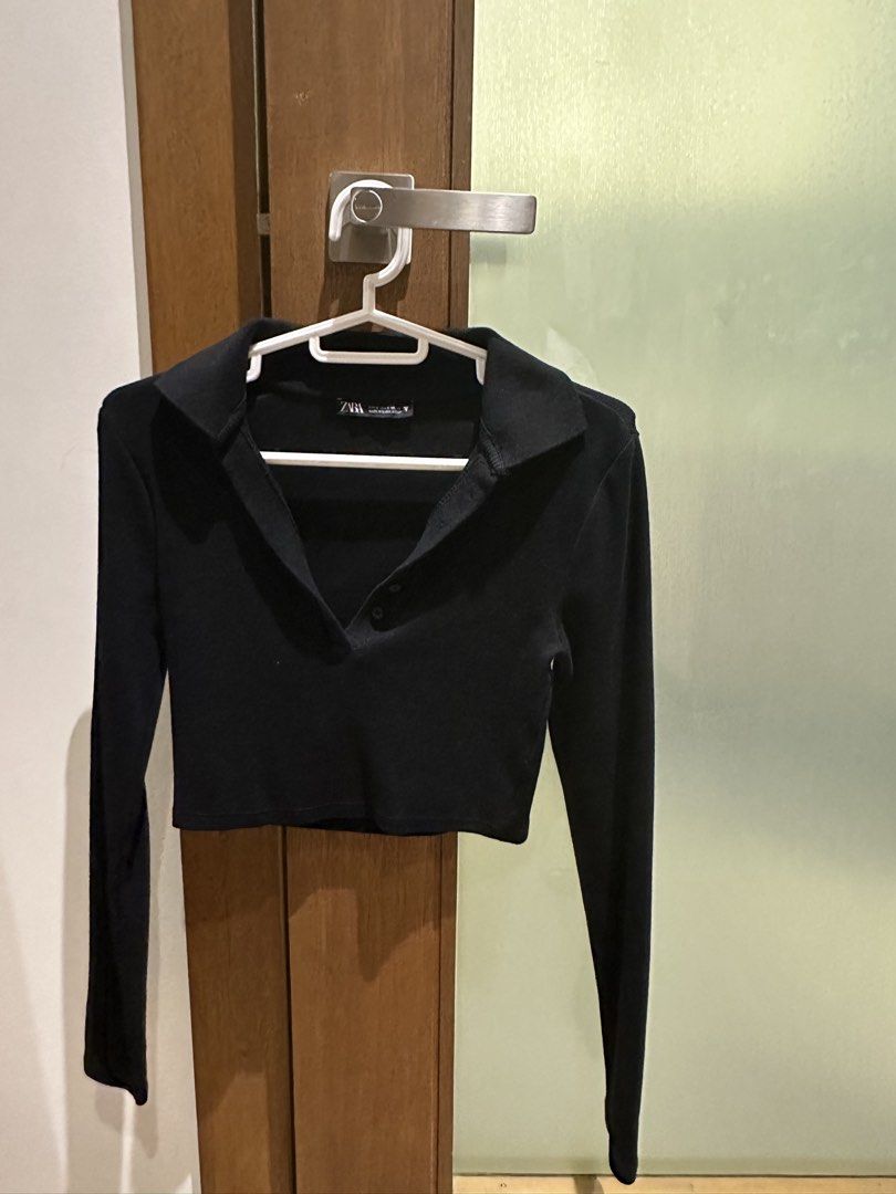 Zara Black Cropped Long Sleeve Top (Category: Longsleeves) located in Manila. Submitted by alemanysof97766 (Listing ID 1438825181, Image 1). Description: - Zara black long sleeve top - Cropped style - Collared neckline - Button details - Versatile piece - Pairs well with high-waisted bottoms.