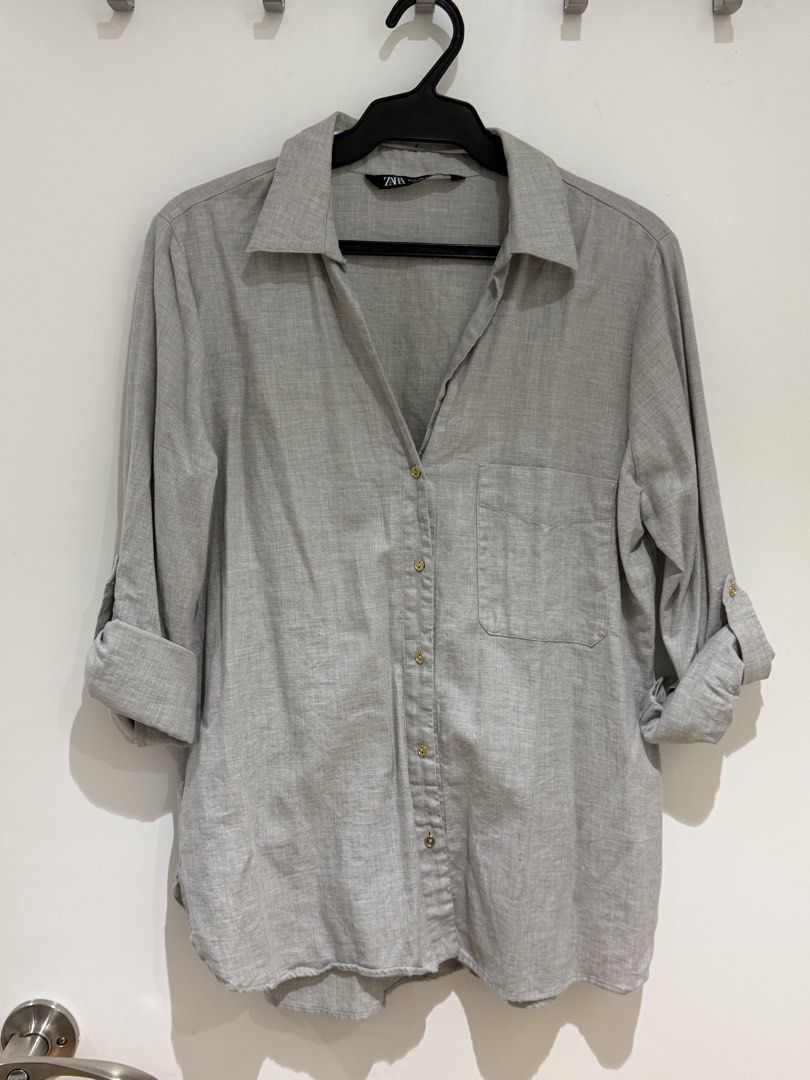 Zara Linen Shirt - Size L (Category: Shirts) located in Makati City. Submitted by delr2191 (Listing ID 1438741298, Image 1). Description: - Zara linen shirt - Color: Light gray - Size: L - Features: Collared neckline, button-down closure, chest pocket - Sleeves can be rolled up - Made in Morocco Used 2x.