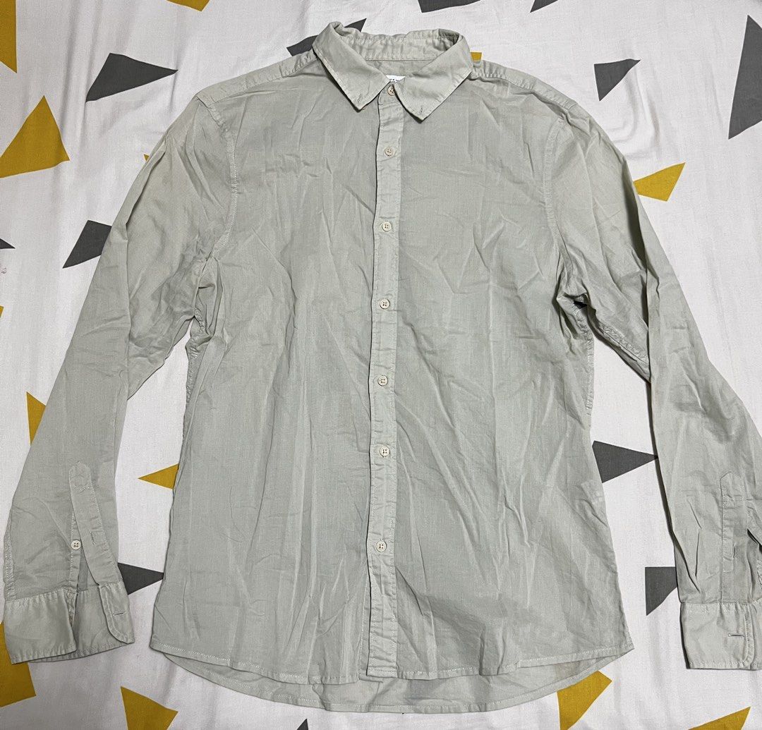 Zara Long Sleeve Shirt - Size M (Category: Tshirts & Polo Shirts ) located in Manila. Submitted by keanep (Listing ID 1438844472, Image 1). Description: - Zara long sleeve shirt - Size: M - Features: Button-down front, classic collar - Color: Light, neutral - Made in Bangladesh - Versatile for casual and semi-formal wear.
