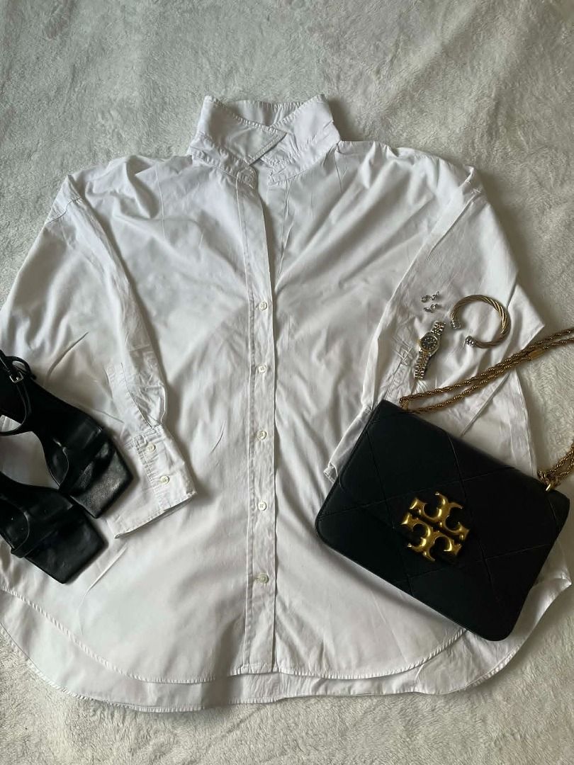 Zara oversized cotton button-down shirt (Category: Longsleeves) located in Pasig City. Submitted by closet_reframe (Listing ID 1438824200, Image 1). Description: Zara oversized long sleeves polo. Nice quality fabric with a soft feel and relaxed oversized fit. Buttons and stitching are still well-kept, overall still in good condition and easy to style. Bag and shoes are also for sale! S: XL.
