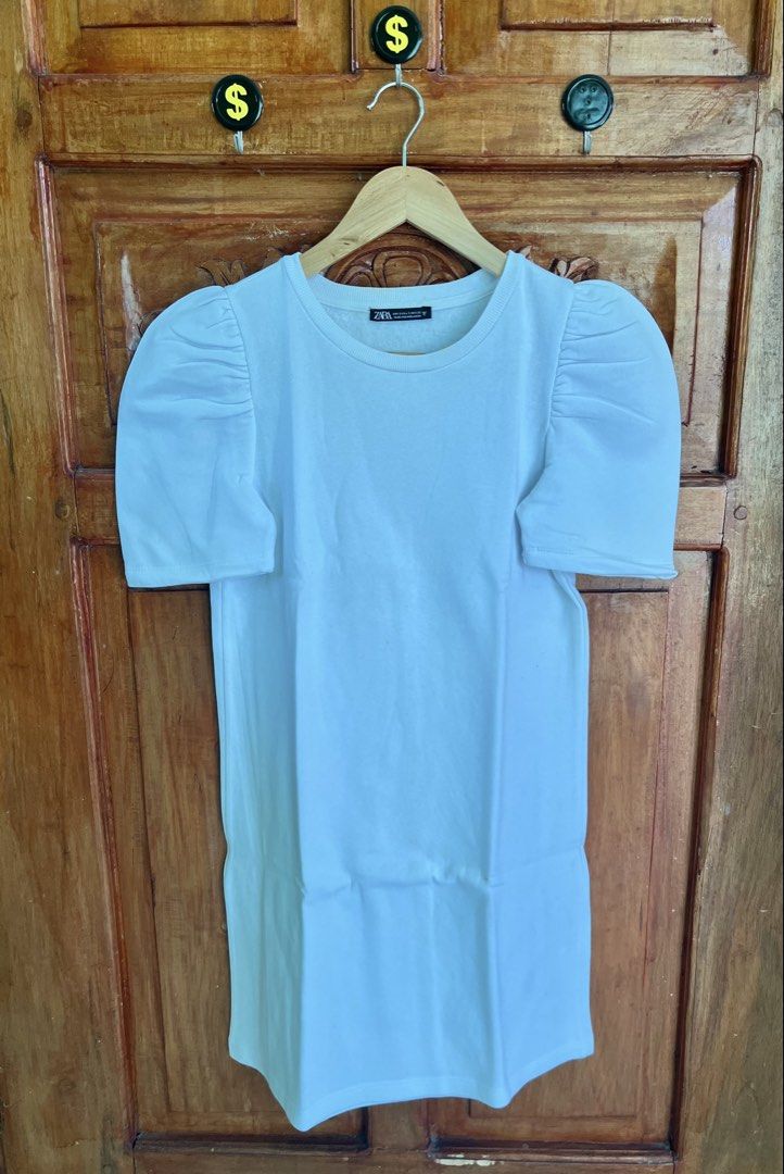 Zara Puff Sleeve T-shirt (Category: Shirts) located in San Fernando. Submitted by prettyfinds2021 (Listing ID 1438750161, Image 1). Description: - Zara t-shirt with puff sleeves - Round neckline - Available colors: White, Light Purple - Size: S - Made in Bangladesh ***GET THE TWO ZARA PUFF SLEEVES DRESSES FOR ONLY ₱1,000***.