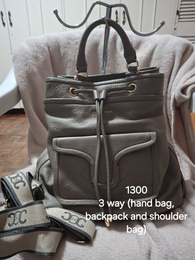 3-Way Handbag for SALE (Category: Tote Bags) located in Pasig City. Submitted by elanisonwhat (Listing ID 1435612439, Image 1). Description: - handbag - Neutral grey color - Convertible: Hand bag, backpack, or shoulder bag - Drawstring closure - Two front pockets - Includes patterned shoulder strap DM for inquiries Negotiable.