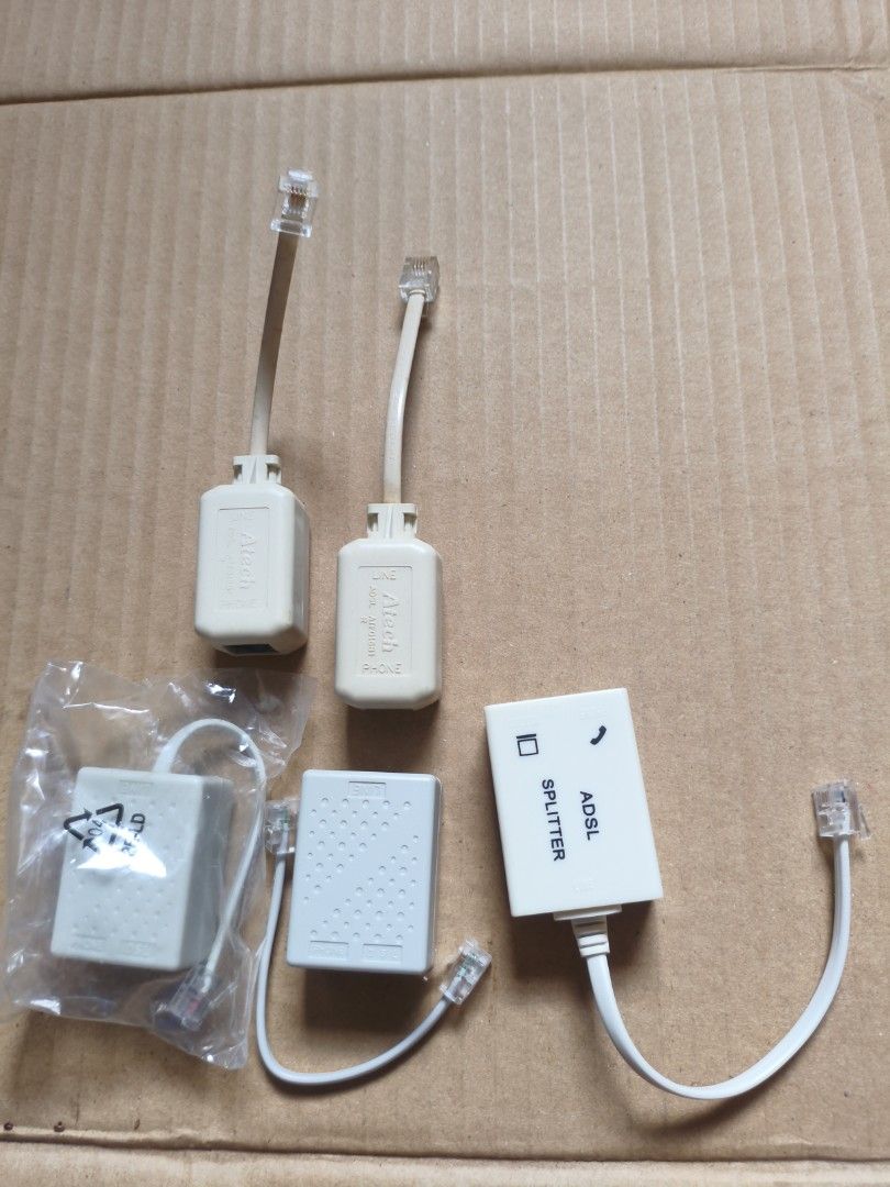 5pcs ADSL Splitters (3x 2 slots, 2x 1 slot) (Category: Cables & Adaptors) located in Pasig City. Submitted by coolphoenix-29ac (Listing ID 1435533244, Image 1). Description: never used 5pcs ADSL Splitters (3x 2 slots, 2x 1 slot).