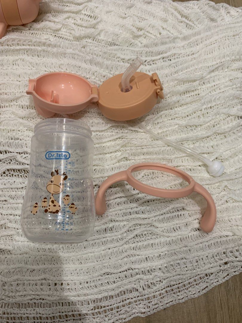 [RUSH] 4pcs sippy cups (2 pink, gray, yellow bear) (Category: Breastfeeding & Bottle Feeding) located in Pasay City. Submitted by krome.ph (Listing ID 1435566325, Image 2). Description: 🟢 pink 2pcs - ₱150 🟢 gray & yellow bear bundle - ₱100 🟡 TAKE ALL 6pcs: ₱200 ⭐️ only used 1-2x, was trying out different sippy cups ⭐️ rfs: unused, need tuition funds i have more items available: ☑️ highchair ☑️ feeding set ☑️ bottles & sippy cups ☑️ bath set ☑️