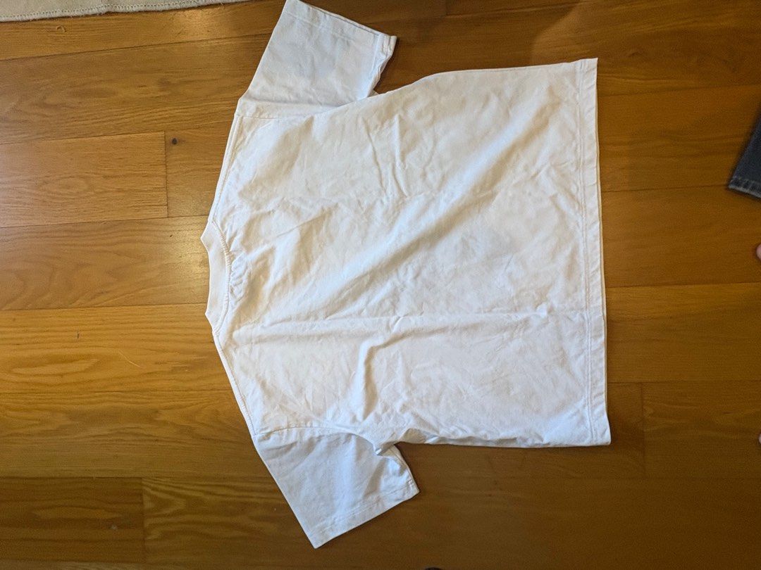 Acne Studios White T-shirt (Category: Tshirts & Polo Shirts ) located in Quezon City. Submitted by nmuy05 (Listing ID 1435587114, Image 2). Description: - Acne Studios T-shirt - Crew neck - Short sleeves - Brand logo on chest - Made of plain fabric.