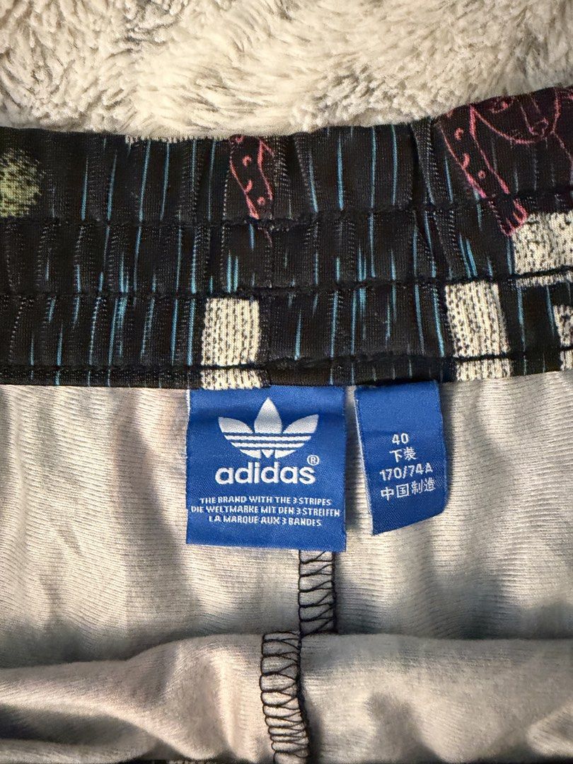 Adidas 3 stripes printed shorts (Category: Shorts) located in Hagunoy. Submitted by declutterwine (Listing ID 1435578768, Image 3). Description: Used twice, too big for me now Decluttering Fits 28-29 waistline.