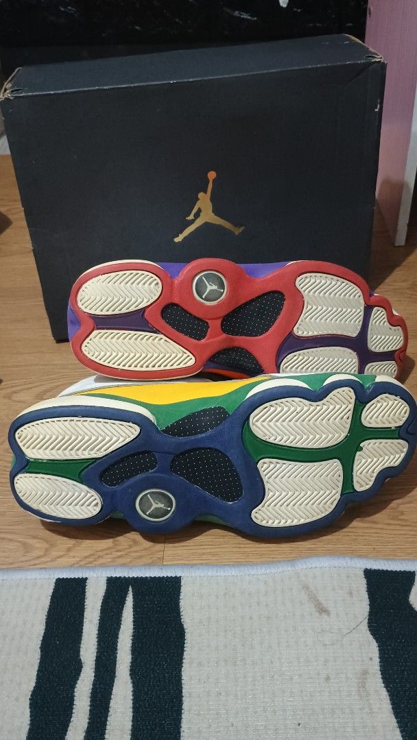 Air Jordan 13 Multicolor (Category: Sneakers) located in Plaridel. Submitted by QualityShop (Listing ID 1435666925, Image 2). Description: - Air Jordan 13 sneakers - White upper - Multicolor accents - Comes with original black box featuring the Jumpman logo - Unique sole color pattern - Includes original box - White laces negotiable.