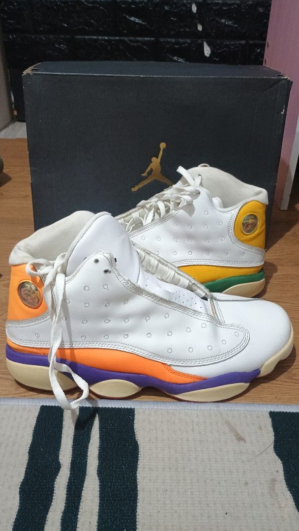 Air Jordan 13 Multicolor (Category: Sneakers) located in Plaridel. Submitted by QualityShop (Listing ID 1435666925, Image 3). Description: - Air Jordan 13 sneakers - White upper - Multicolor accents - Comes with original black box featuring the Jumpman logo - Unique sole color pattern - Includes original box - White laces negotiable.