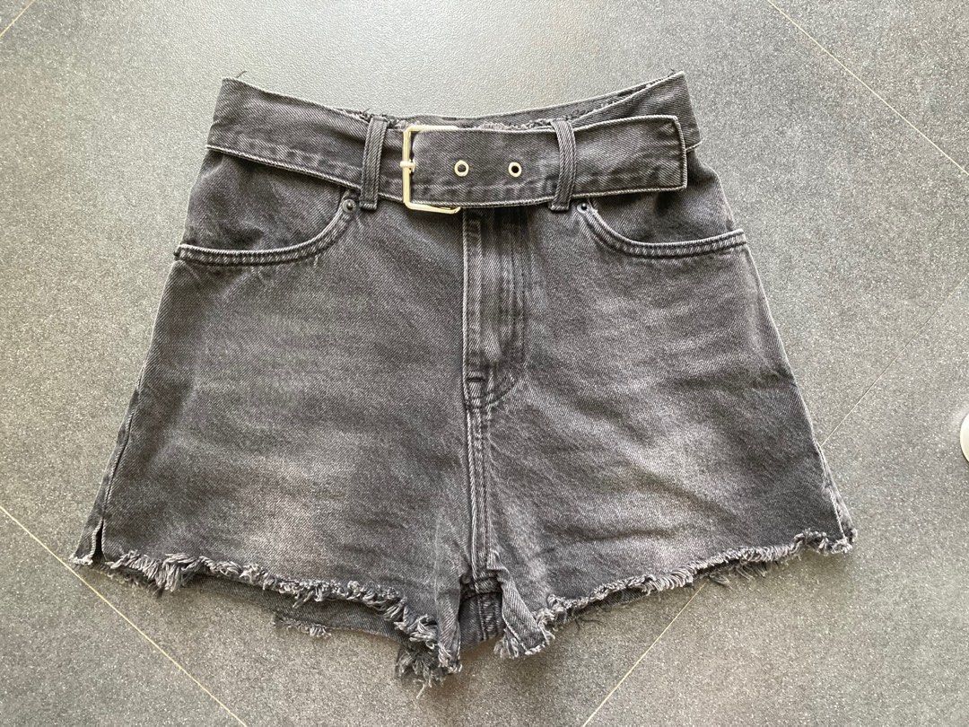 Alexander Wang Black Denim Shorts 24 (Category: Shorts) located in Batangas. Submitted by mumbee (Listing ID 1435641063, Image 2). Description: Alexander Wang black denim shorts. Features a cut-off, frayed hem and silver buckle belt. Includes pockets and a zipper/button closure. Size 24 but runs loose. See pics for actual measurements. Like new, no flaws. RFS: Prefer longer hem.