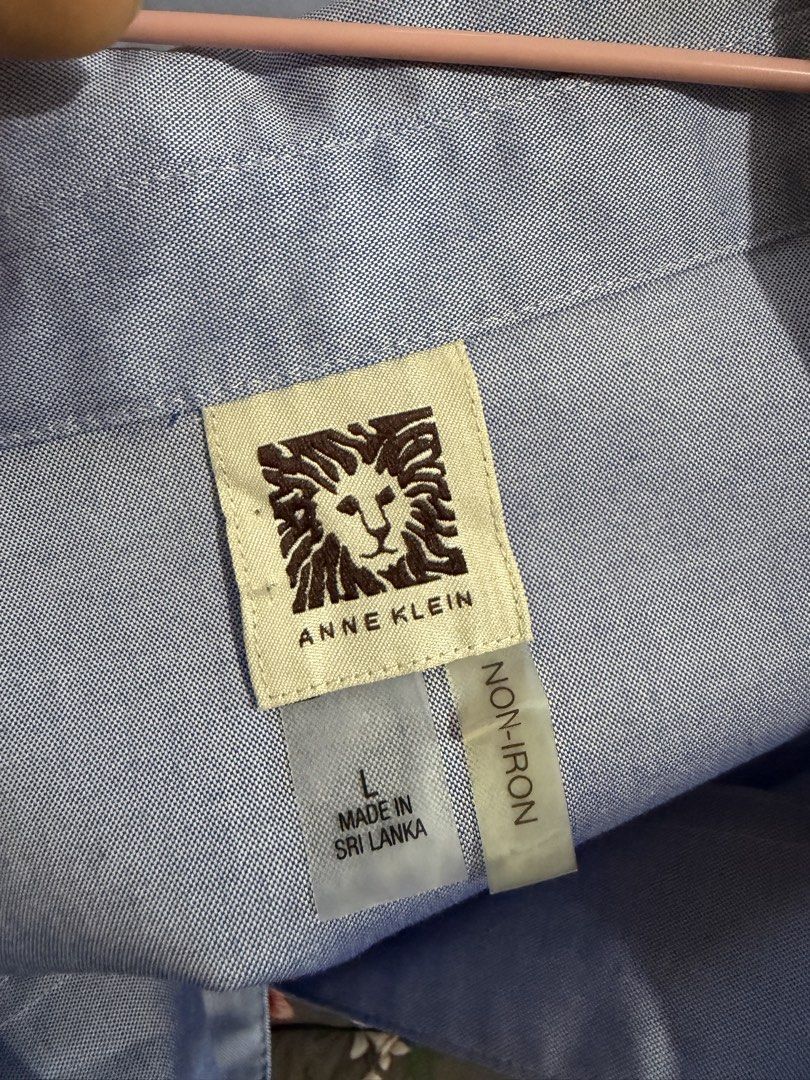 Anne Klein Blue Blouse (Category: Blouses) located in Apalit. Submitted by ic_declutter (Listing ID 1435601170, Image 3). Description: - Anne Klein blouse - Light blue color - Size: Large - Long sleeves - Collared neckline - Button-down closure - Non-iron fabric - Made in Sri Lanka.