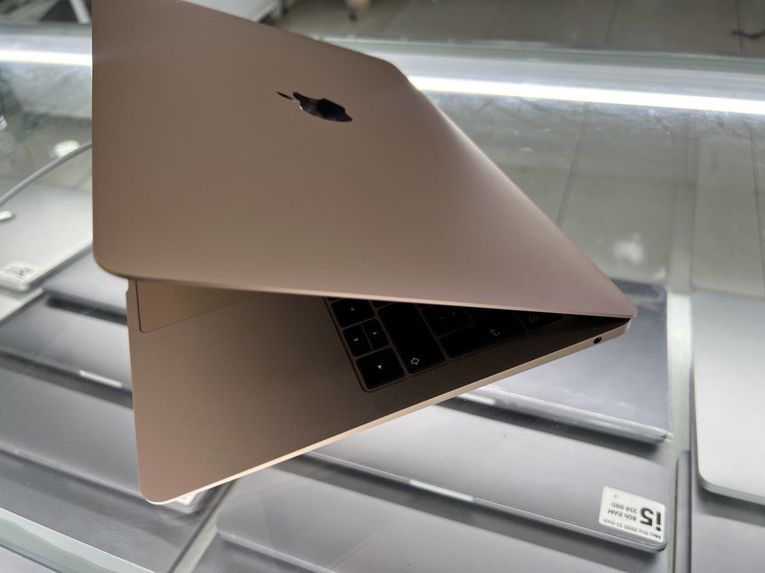 Apple Macbook Air (Category: Laptops & Notebooks) located in Manila. Submitted by vaniextura (Listing ID 1435619432, Image 3). Description: - Gold MacBook Air - 2019 core i5 -memory 8gb - storage 128ssd -Cc 162 - Backlit keyboard - Large trackpad - Scenic wallpaper - Apple logo on lid - Includes charging cable - Standard QWERTY keyboard.
