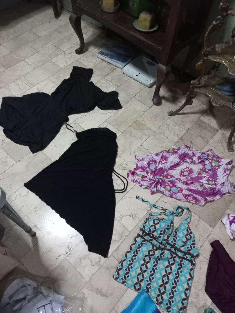 Assorted Swimwear - Bikini, Shorts, Cover-up (Category: Bikinis & Swimsuits) located in Quezon City. Submitted by msdcshop (Listing ID 1435641699, Image 2). Description: - Swimwear collection for beach or pool. - Includes: - Bikinis (purple & white, teal & brown) - Shorts (blue) - Cover-up (green) - Dress (black) - Halter top (purple & white) - Various colors and patterns. - 2 piece/one piece/cullotes/tube/bikinis etc - take all for only 500.00 -