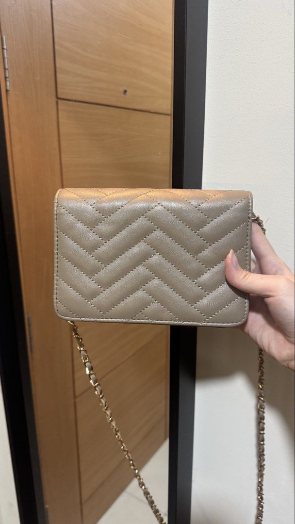 Bebe long strap bag (Category: Cross-body Bags) located in Taguig. Submitted by kimdeclutterss (Listing ID 1435627348, Image 3). Description: Used 3-4x for parties Rfs: natatambak nalanggg Bought from US Last photo for flaws, may part ng lining na naremove ang leather, but barely notice noticeable because nasa ilalim siya.