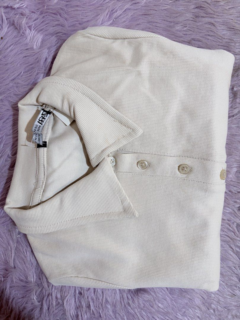 Beige Polo Dress (Category: Dresses) located in Meycauayan. Submitted by _cbear (Listing ID 1435556830, Image 1). Description: - Zara beige polo dress - XS to S (Could fit Medium) - Collared neckline - Button-down closure - Ribbed texture - Tag is visible -Never Worn .