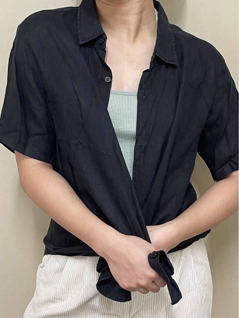 Black Linen Short Sleeve Shirt (Category: Shirts) located in Cavite. Submitted by ellanierva (Listing ID 1435573688, Image 1). Description: - Black linen shirt - Short-sleeved - Button-down front - Collared neckline - Relaxed fit - Solid black color - Can be worn open or closed.