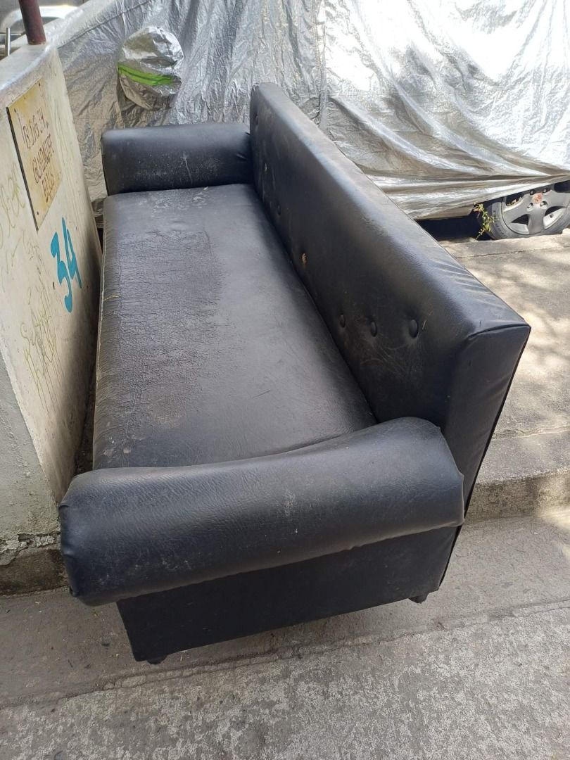 Black Sofa (Category: Sofas) located in Manila. Submitted by lcsebastia38580 (Listing ID 1435614005, Image 1). Description: - Black sofa - Rectangular shape - Features armrests - Made with a leather-like material - Button-detailed backrest - For indoor use.