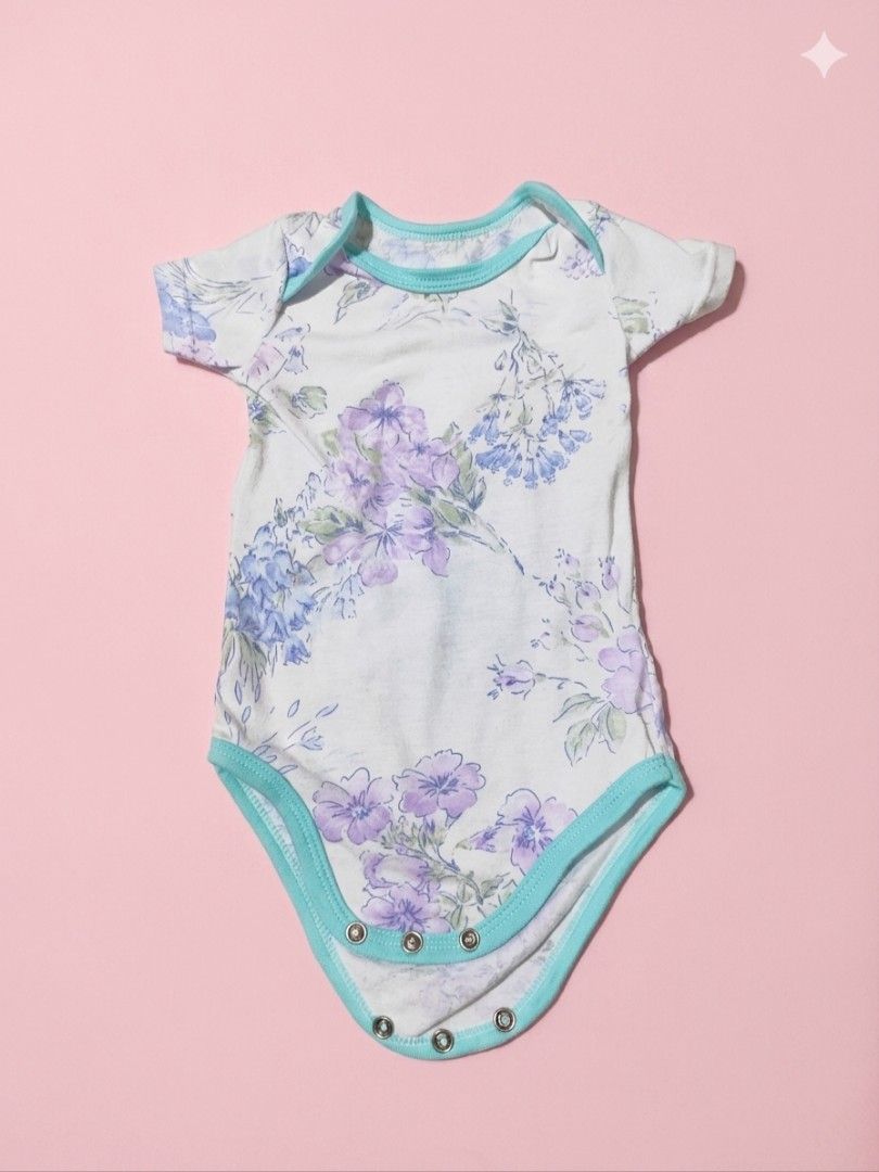 Blue flower design onesie (0-3 months) (Category: Babies & Kids Fashion) located in Manila. Submitted by ellesesg (Listing ID 1435548278, Image 1). Description: .