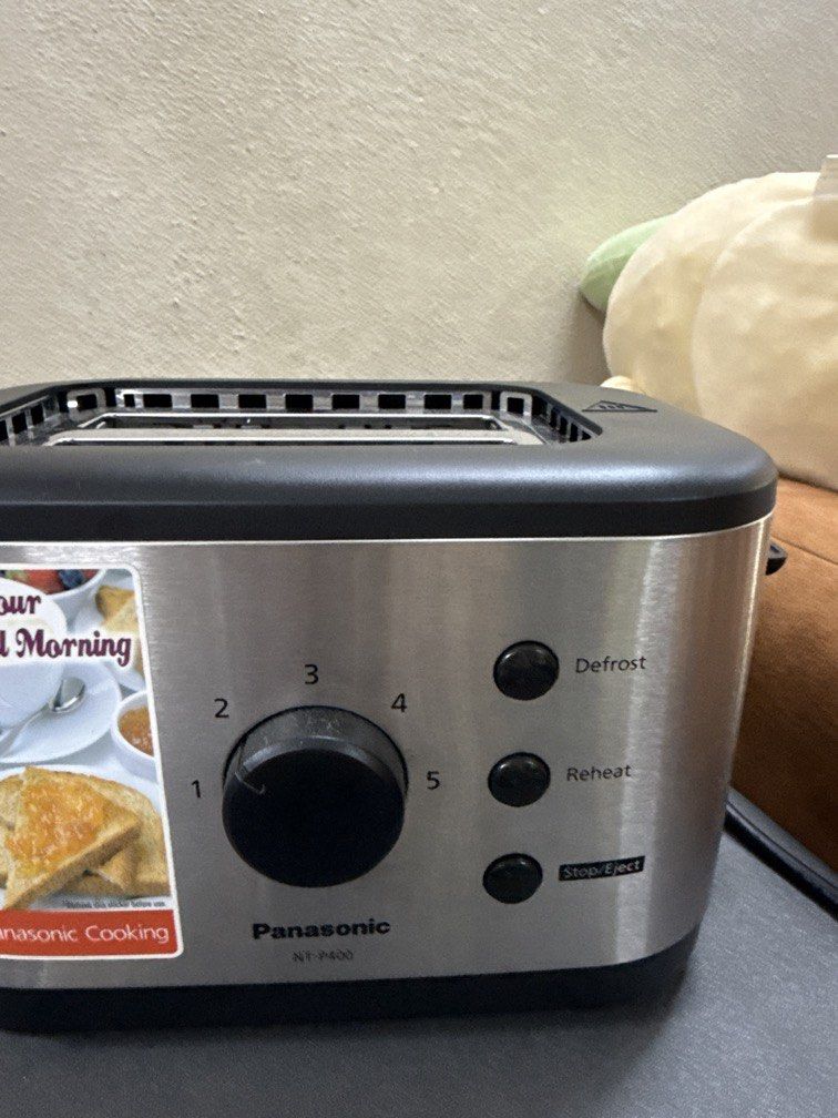 Bread toaster (Category: Ovens & Toasters) located in Gelugor. Submitted by eggy_avocado (Listing ID 1435583515, Image 2). Description: Bread toaster, likely used. . Model NT-P400.