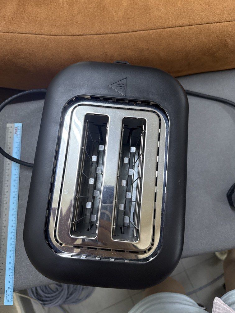 Bread toaster (Category: Ovens & Toasters) located in Gelugor. Submitted by eggy_avocado (Listing ID 1435583515, Image 3). Description: Bread toaster, likely used. . Model NT-P400.